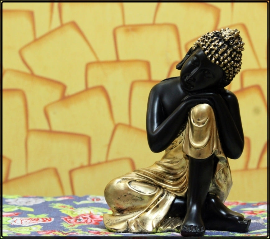 Polyresin Black And Golden Handcrafted Lord Buddha Resting On Knee Statue Kafalo