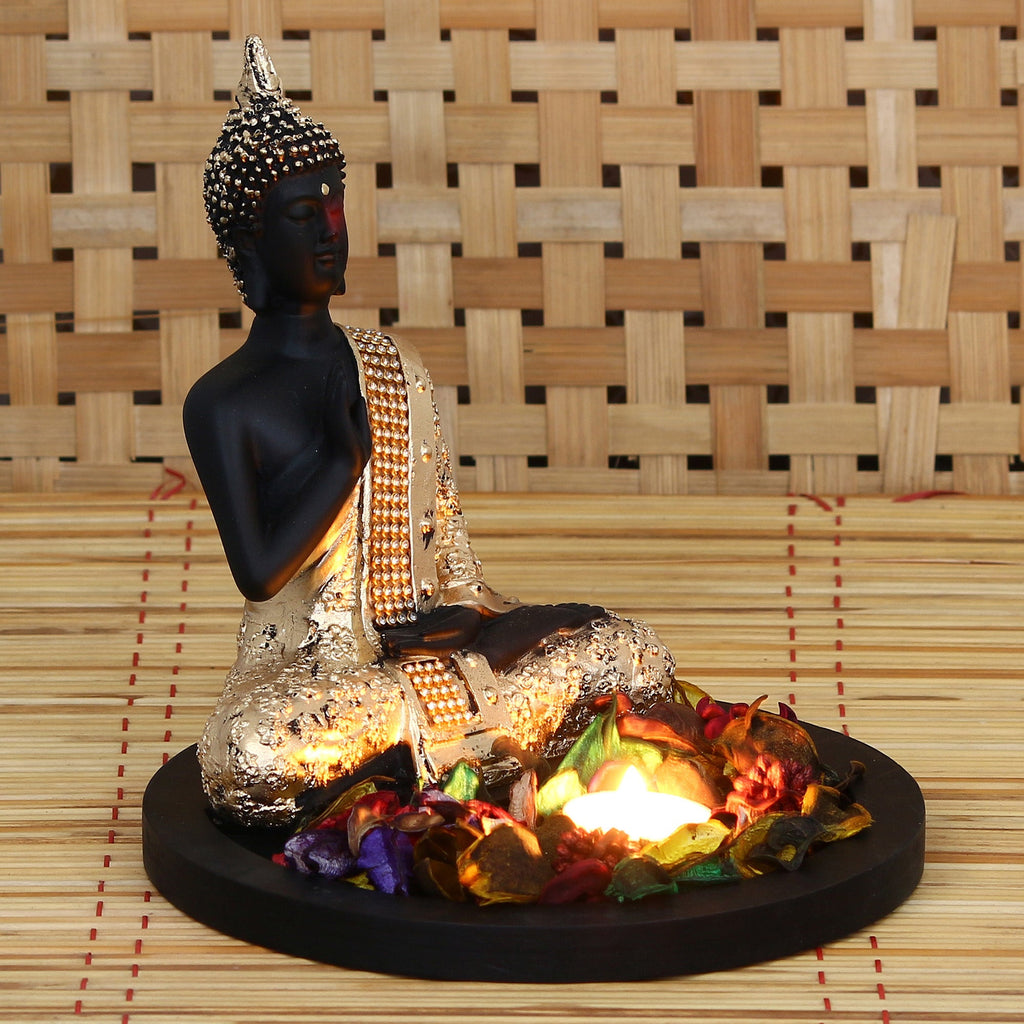 Polyresin Black and Golden Meditating Blessing Buddha Statue with Wooden Base, Fragranced Petals and Tealight Kafalo