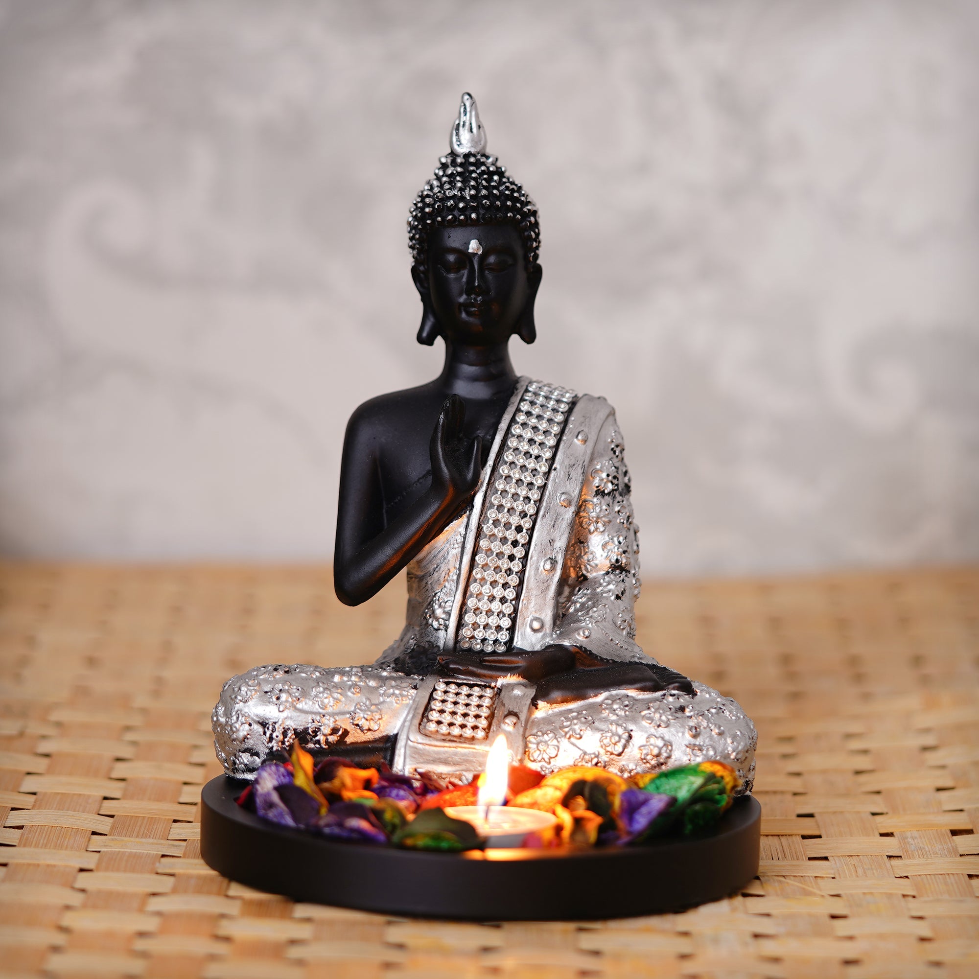 Polyresin Black and Silver Handcrafted Meditating Blessing Buddha Statue with Wooden Base, Fragranced Petals and Tealight Kafalo
