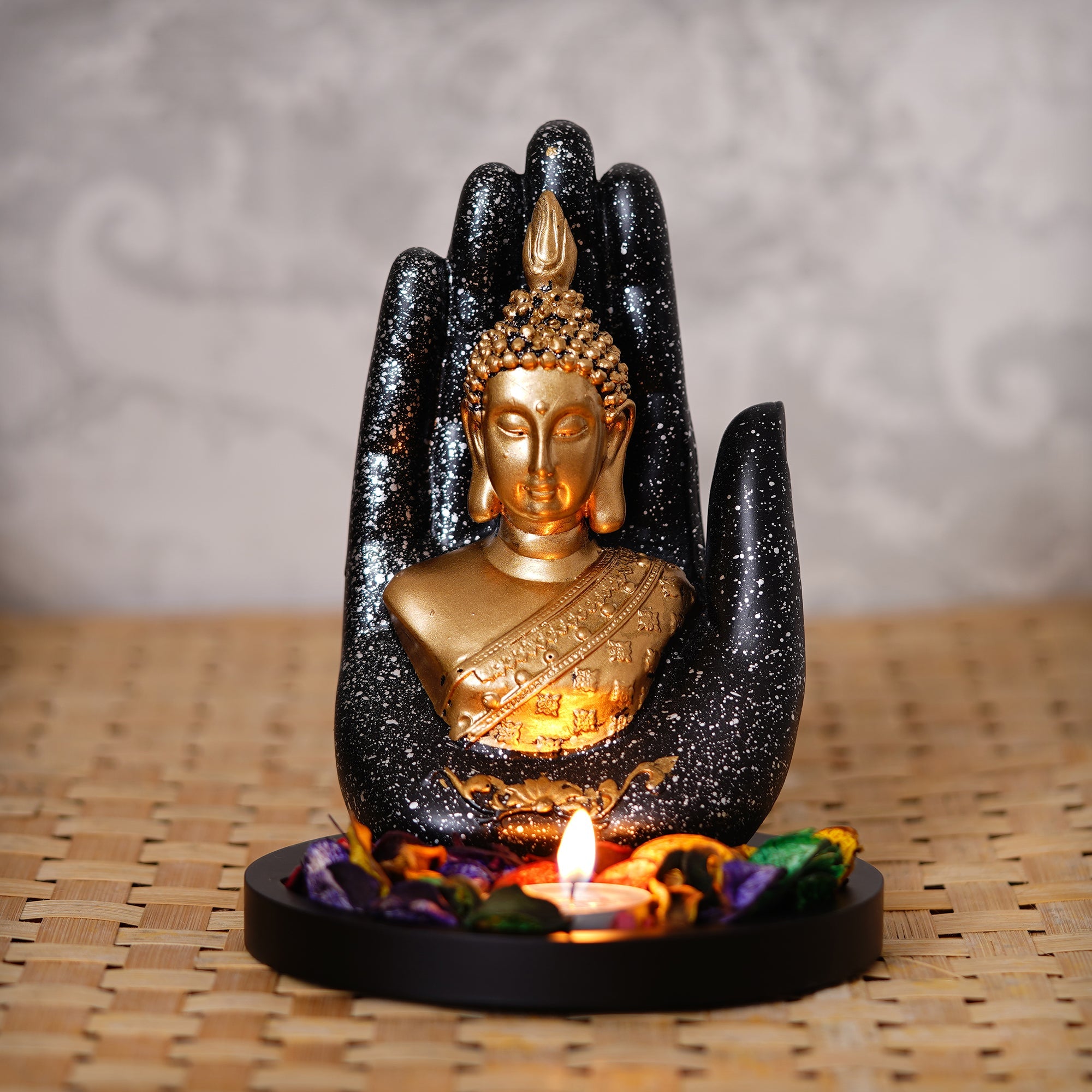 Polyresin Black and Golden Handcrafted Palm Buddha Statue with Wooden Base, Fragranced Petals and Tealight Kafalo