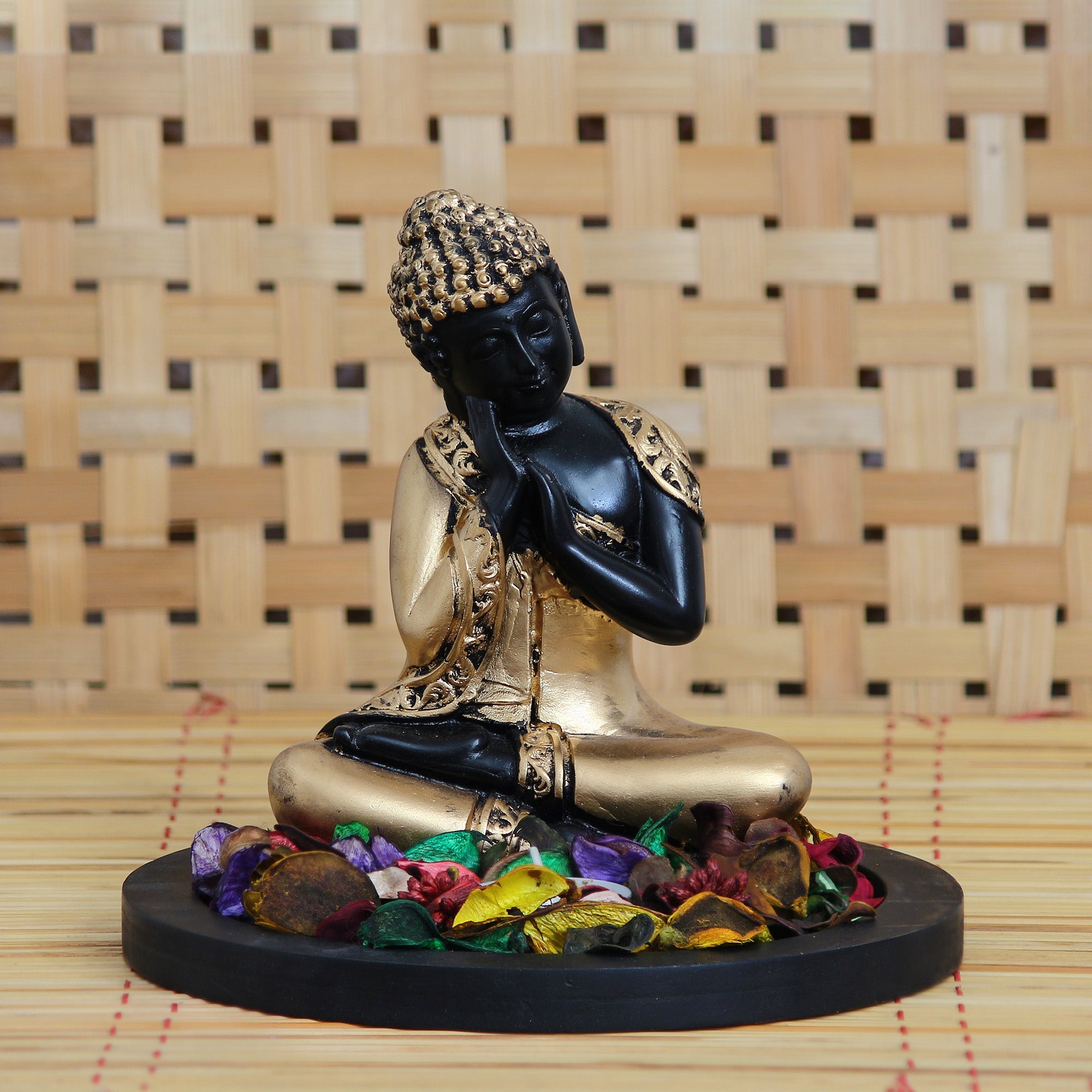 Polyresin Black and Golden Resting Buddha Statue with Wooden Base, Fragranced Petals and Tealight Kafalo