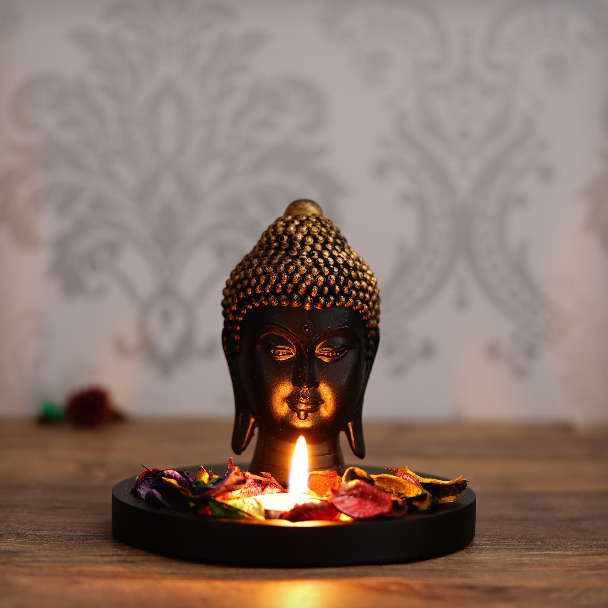 Decorative Black and Golden Buddha Head Statue with Wooden Base, Fragranced Petals and Tealight Kafalo