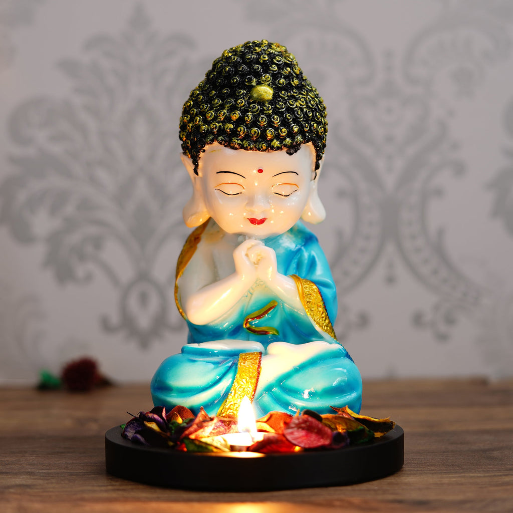 Polyresin Blue and White Praying Monk Buddha Statue with Wooden Base, Fragranced Petals and Tealight Kafalo