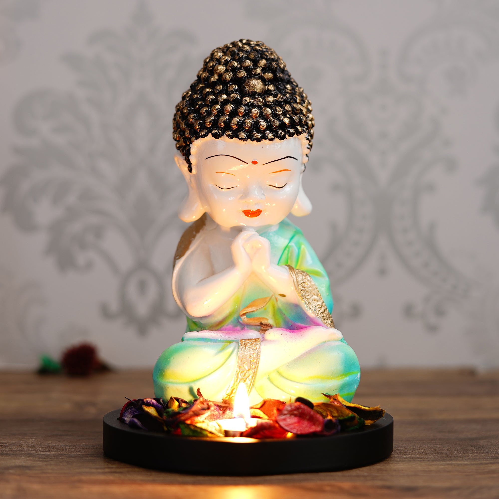 Polyresin Green and White Praying Monk Buddha Statue with Wooden Base, Fragranced Petals and Tealight Kafalo