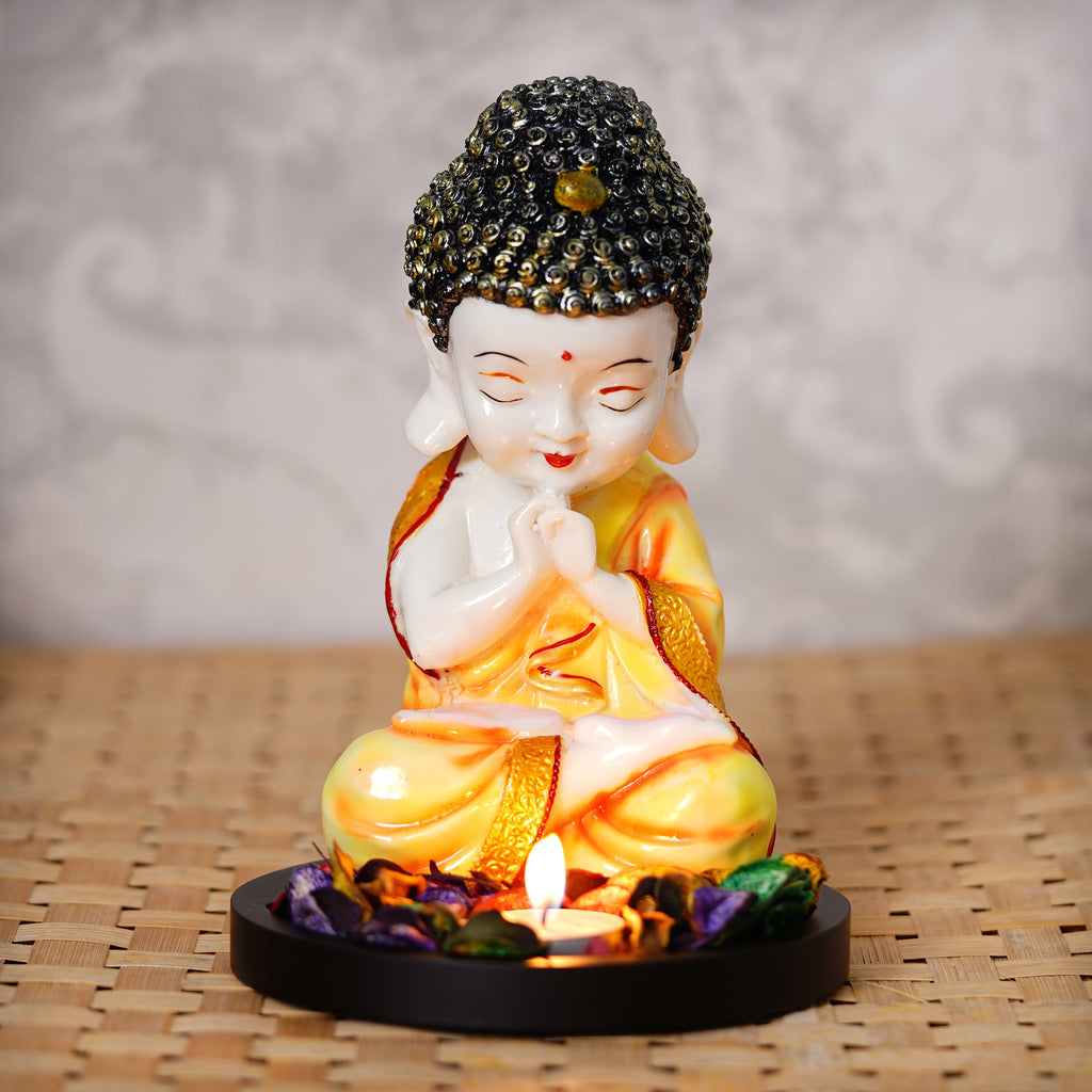 Polyresin Yellow and White Praying Monk Buddha Idol with Wooden Base, Fragranced Petals and Tealight Kafalo