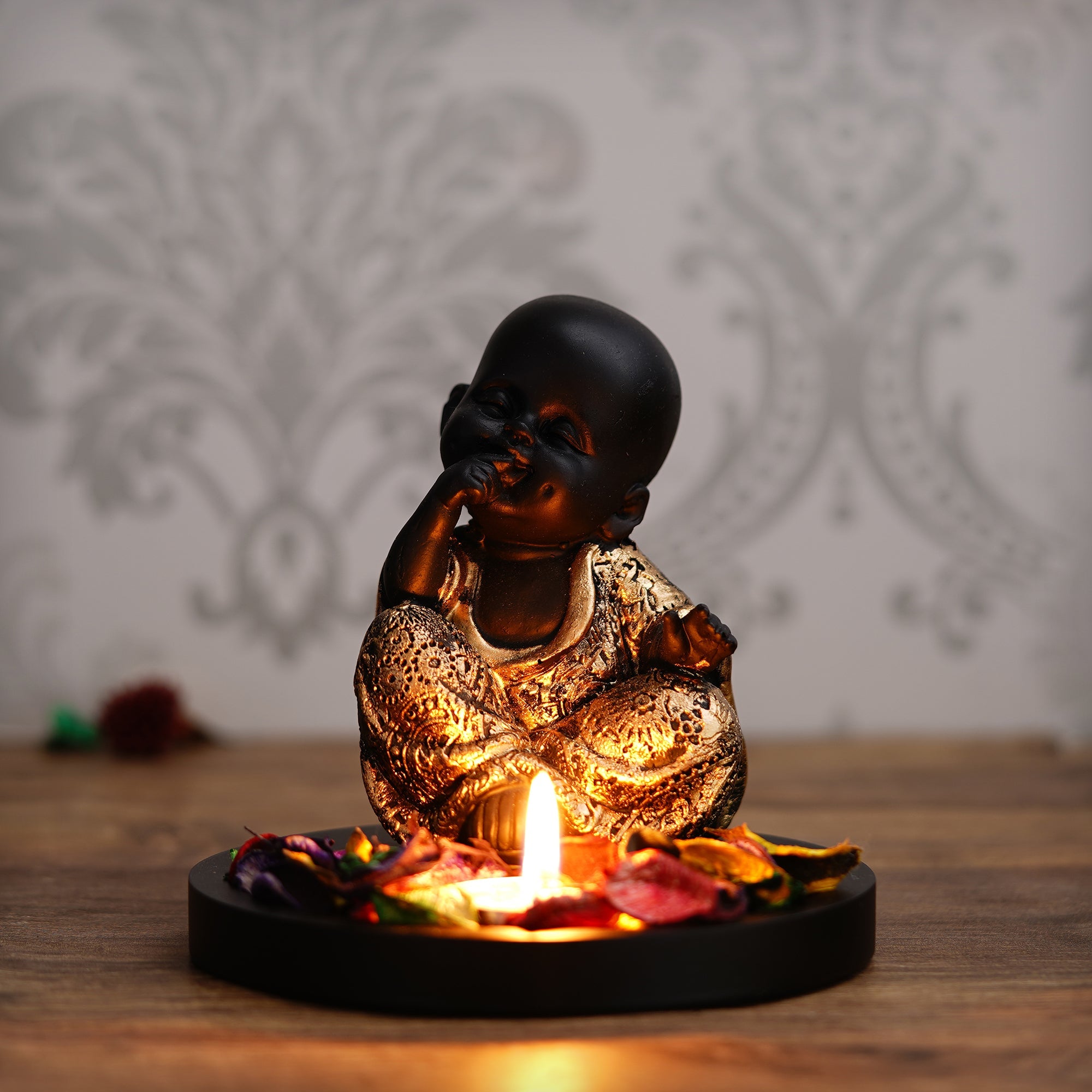 Decorative Smiling Golden Monk Buddha with Wooden Base, Fragranced Petals and Tealight Kafalo