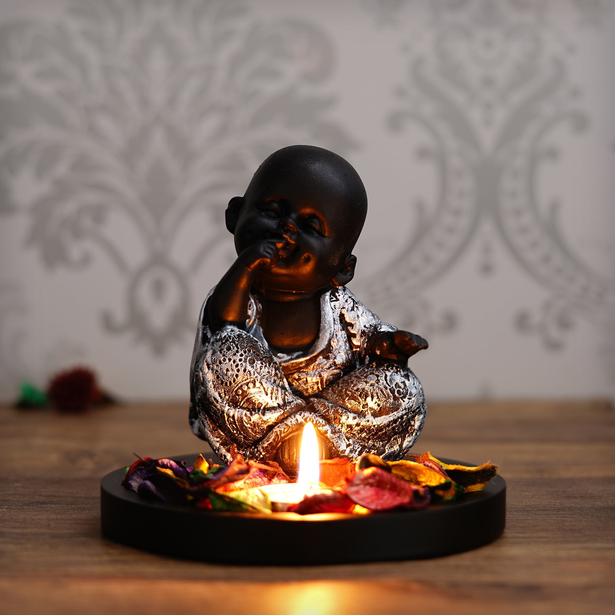 Decorative Smiling Monk Buddha Idol With Wooden Base, Fragranced Petals, And Tealight Kafalo