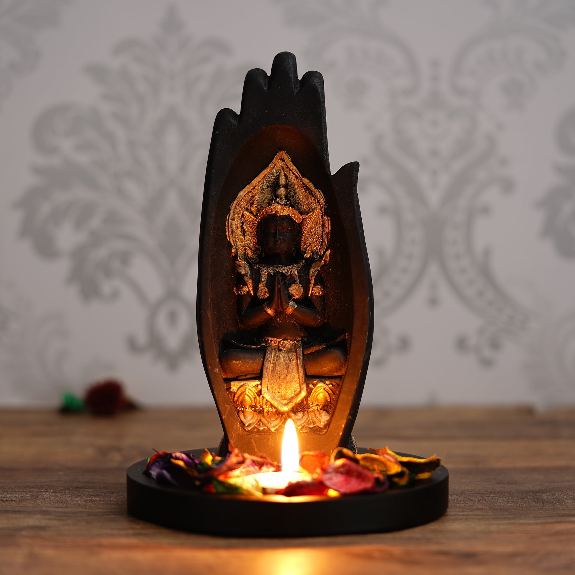 Meditating Buddha Idol Under Palm Decorative Showpiece With Wooden Base, Fragranced Petals, Tealight Holder Kafalo