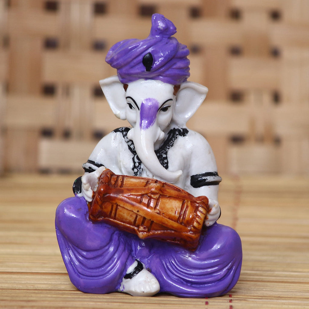 Lord Ganesha playing Dholak Kafalo