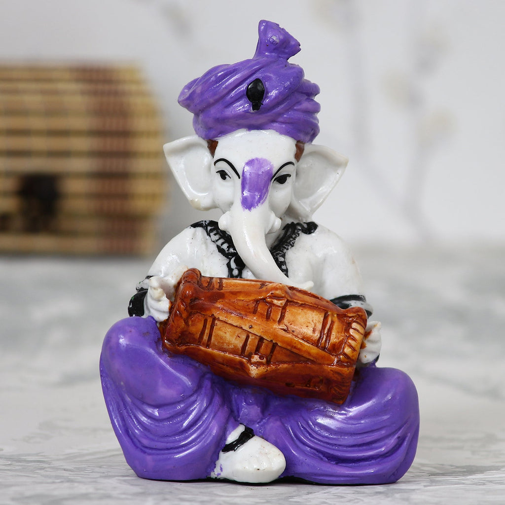 Lord Ganesha playing Dholak Kafalo