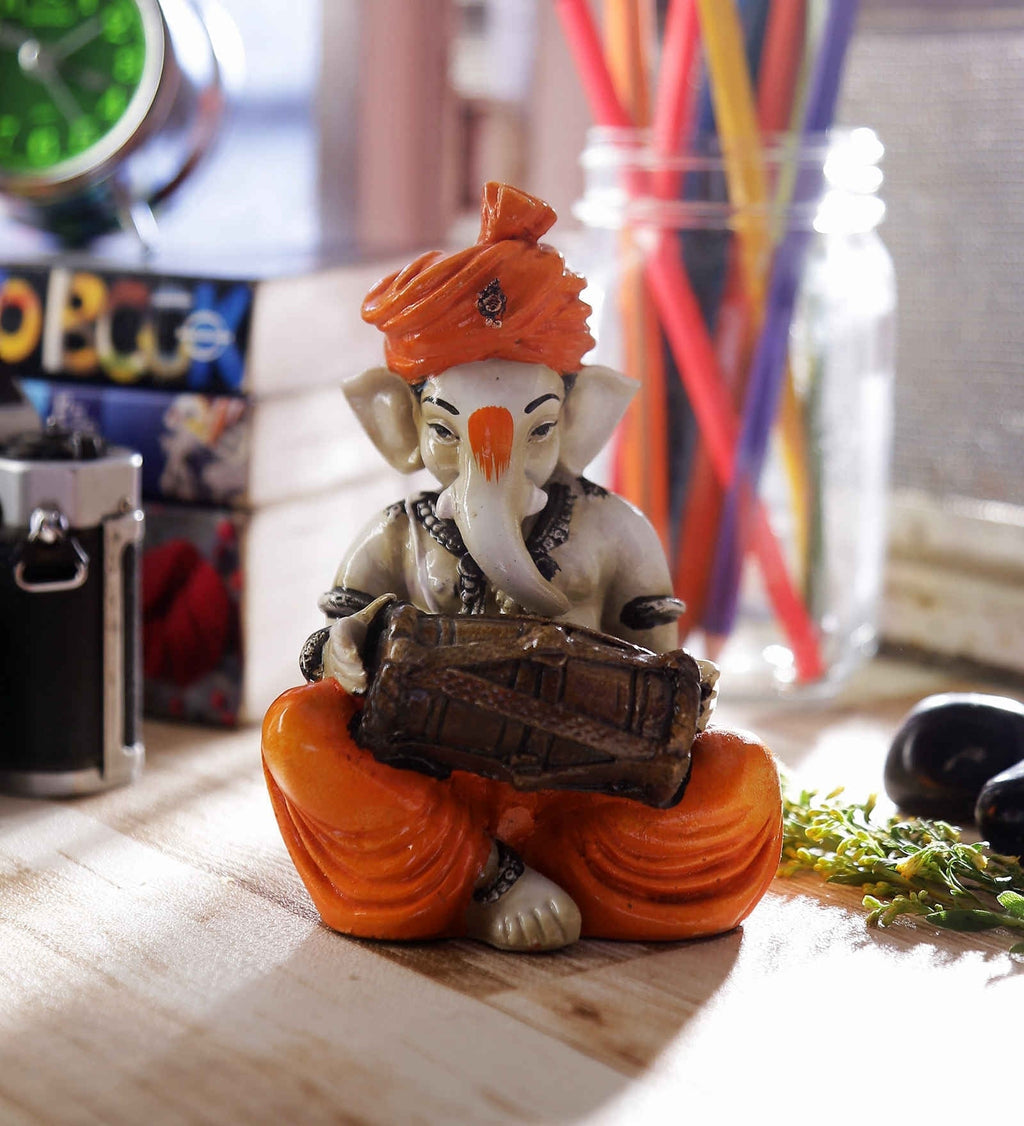 Orange Polyresin Lord Ganesha playing Dholak Idol Kafalo