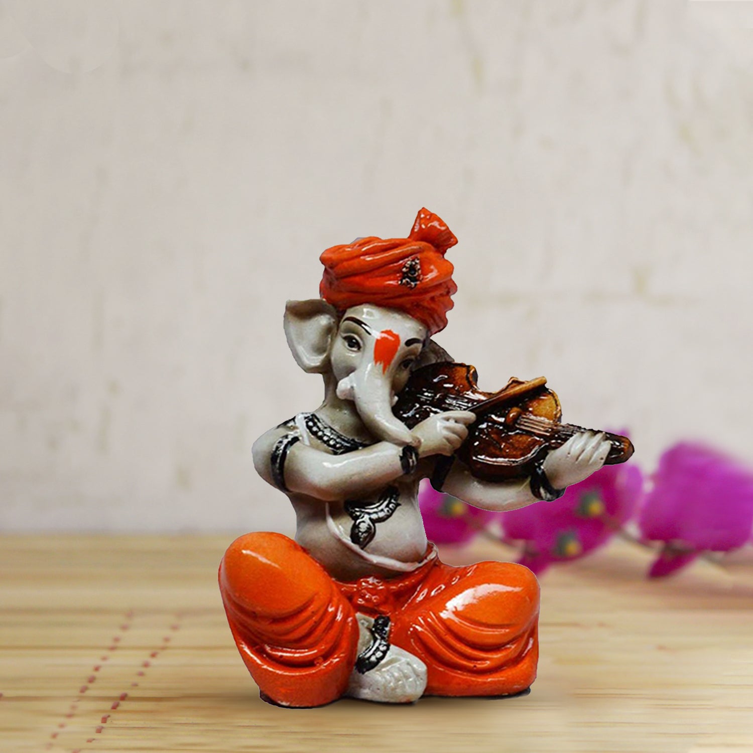 Orange Polyresin Lord Ganesha playing Violin Idol Kafalo