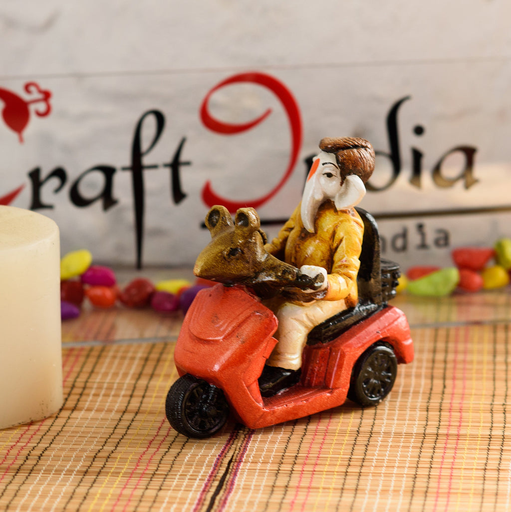 Polyresin Lord Ganesha Idol riding Scooter (Red and Yellow) Kafalo