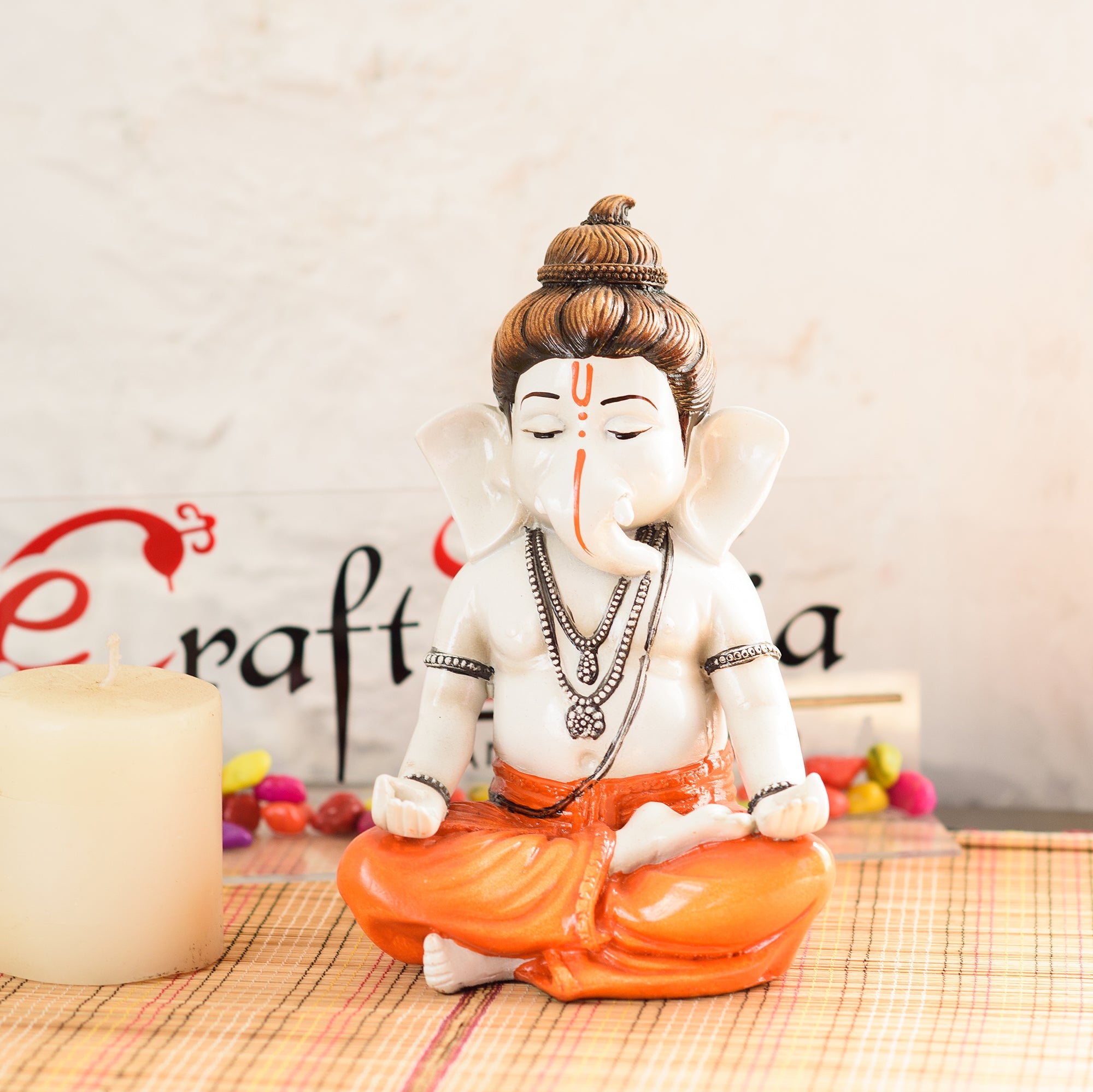 Orange Polyresin Meditating Lord Ganesha Statue Kafalo