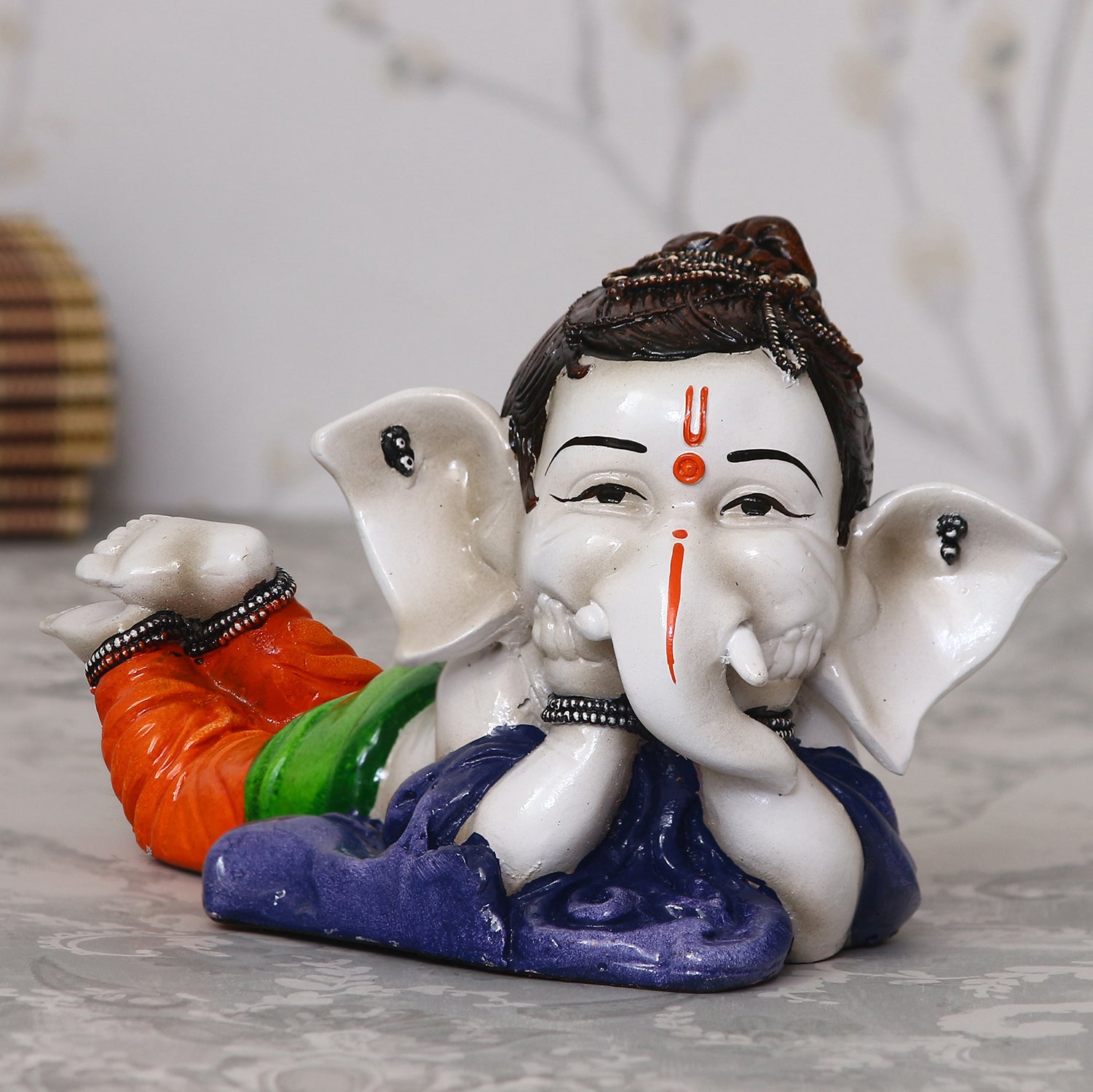 Handcrafted Polyresin Resting Lord Ganesha Idol Kafalo