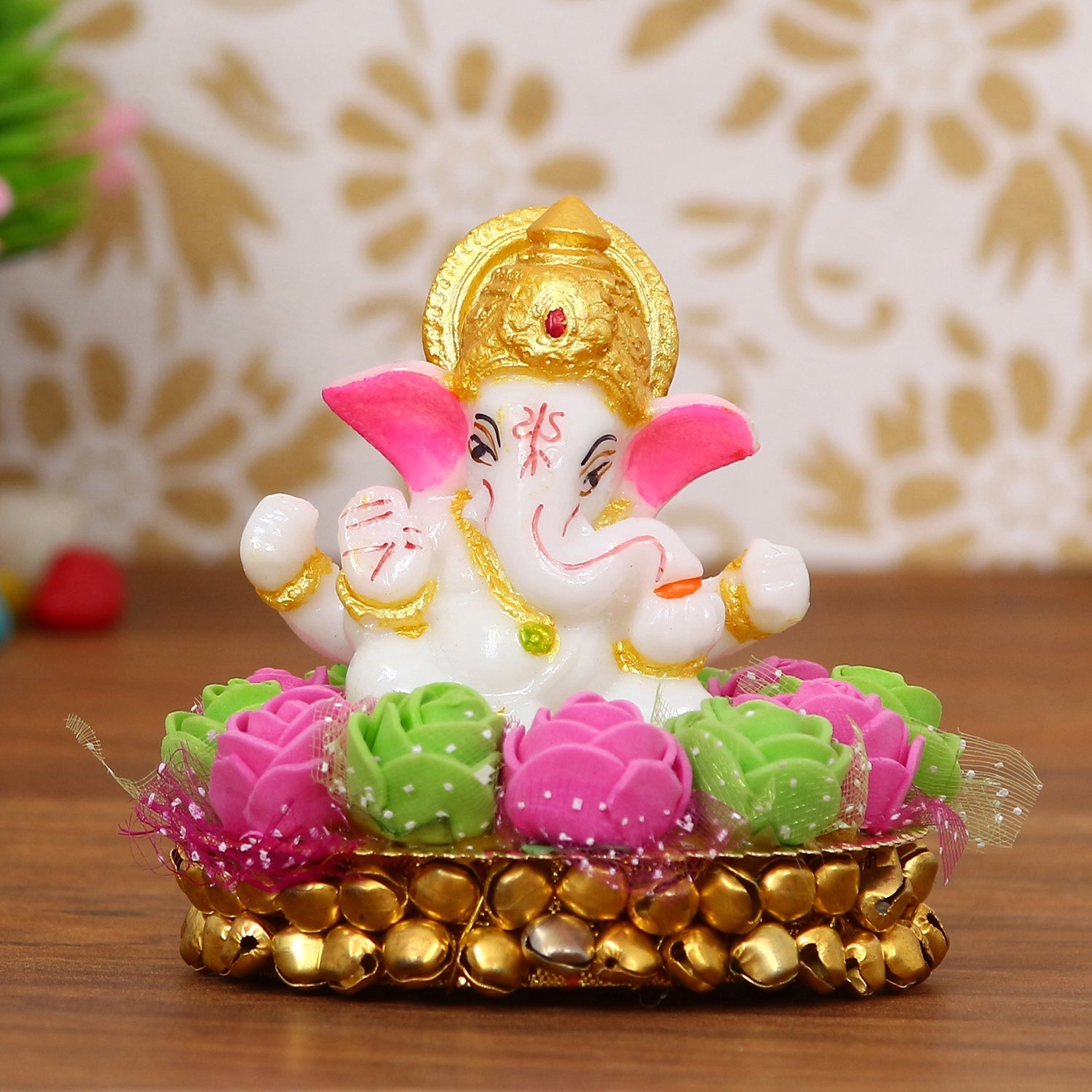 Golden and White Polyresin Lord Ganesha Idol on Decorative Pink and Green Flowers Plate Kafalo