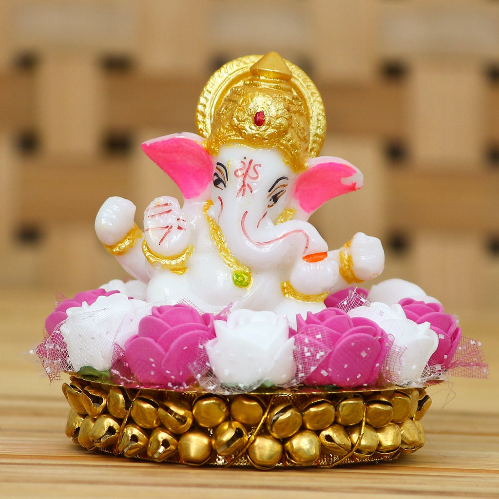 Golden and White Polyresin Lord Ganesha Idol on Decorative Handcrafted Plate with Pink and White Flowers Kafalo