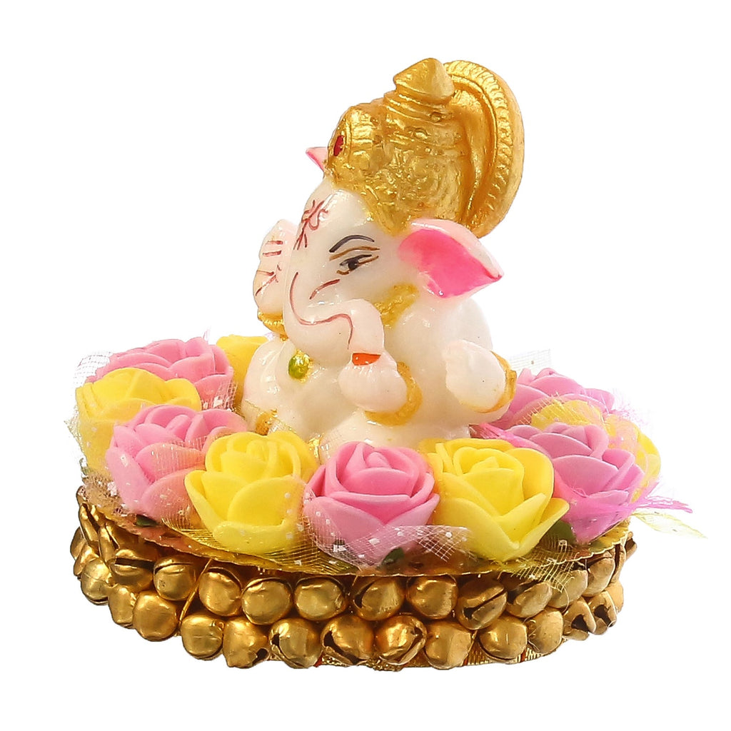 Golden and White Polyresin Lord Ganesha Idol on Decorative Handcrafted Plate with Pink and Yellow Flowers Kafalo