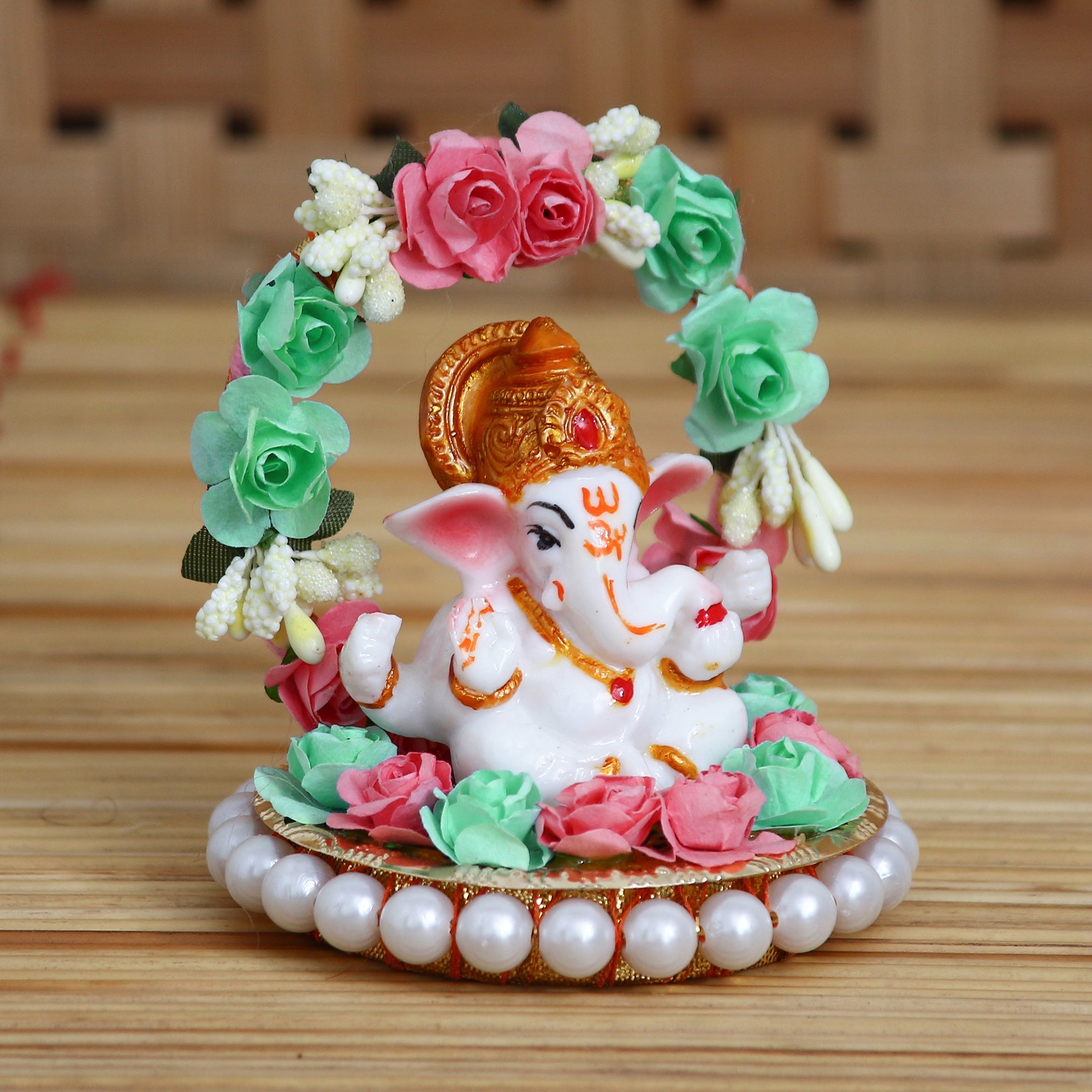 Lord Ganesha Idol On Decorative Handicrafted Plate With Throne Of Pink And Green Flowers Kafalo