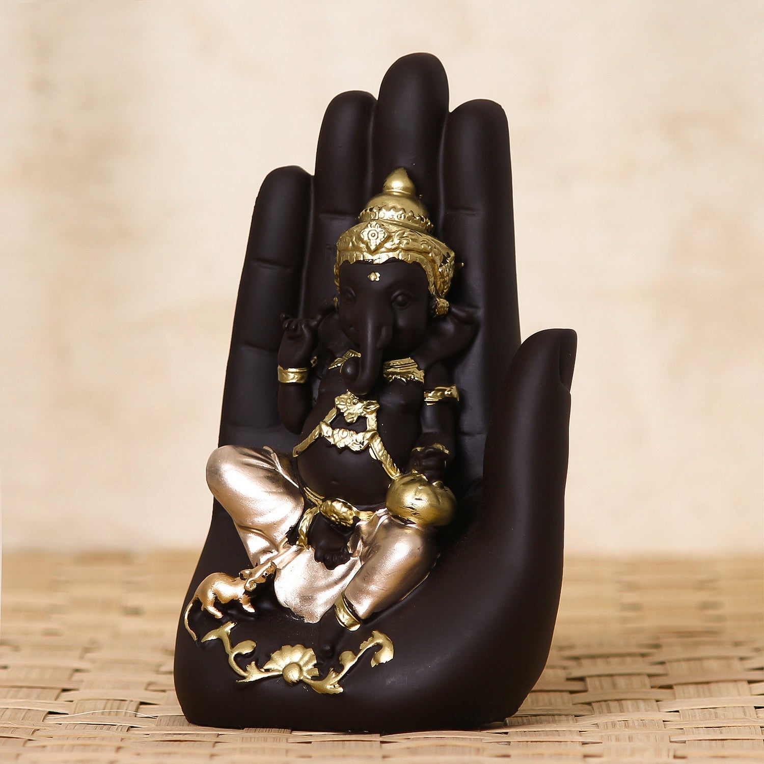 Black and Golden Handcrafted Polyresin Palm Ganesha Idol Kafalo