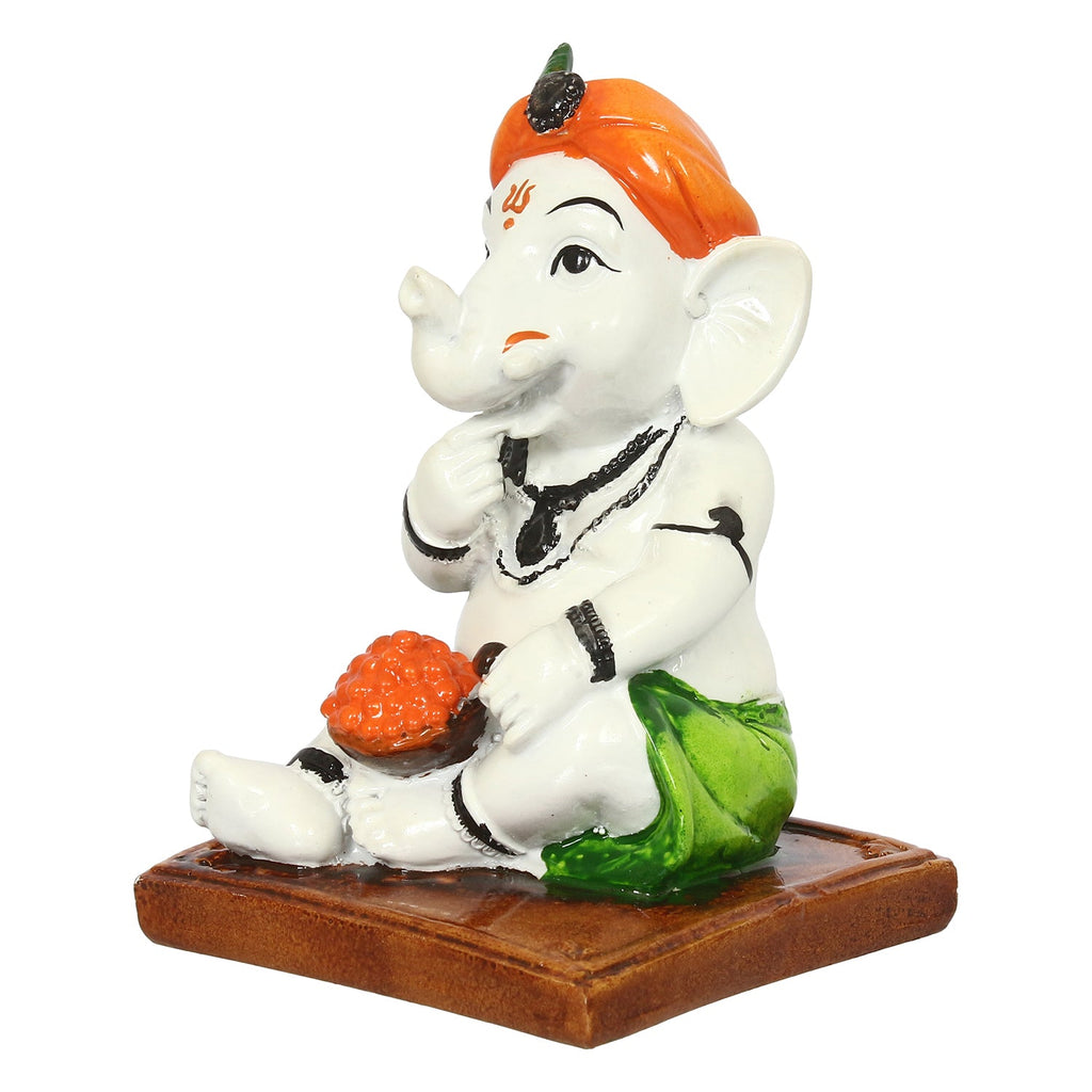 Decorative Polyresin Lord Ganesha Idol eating Ladoo in Lord Krishna Avatar (White, Orange, Green) Kafalo