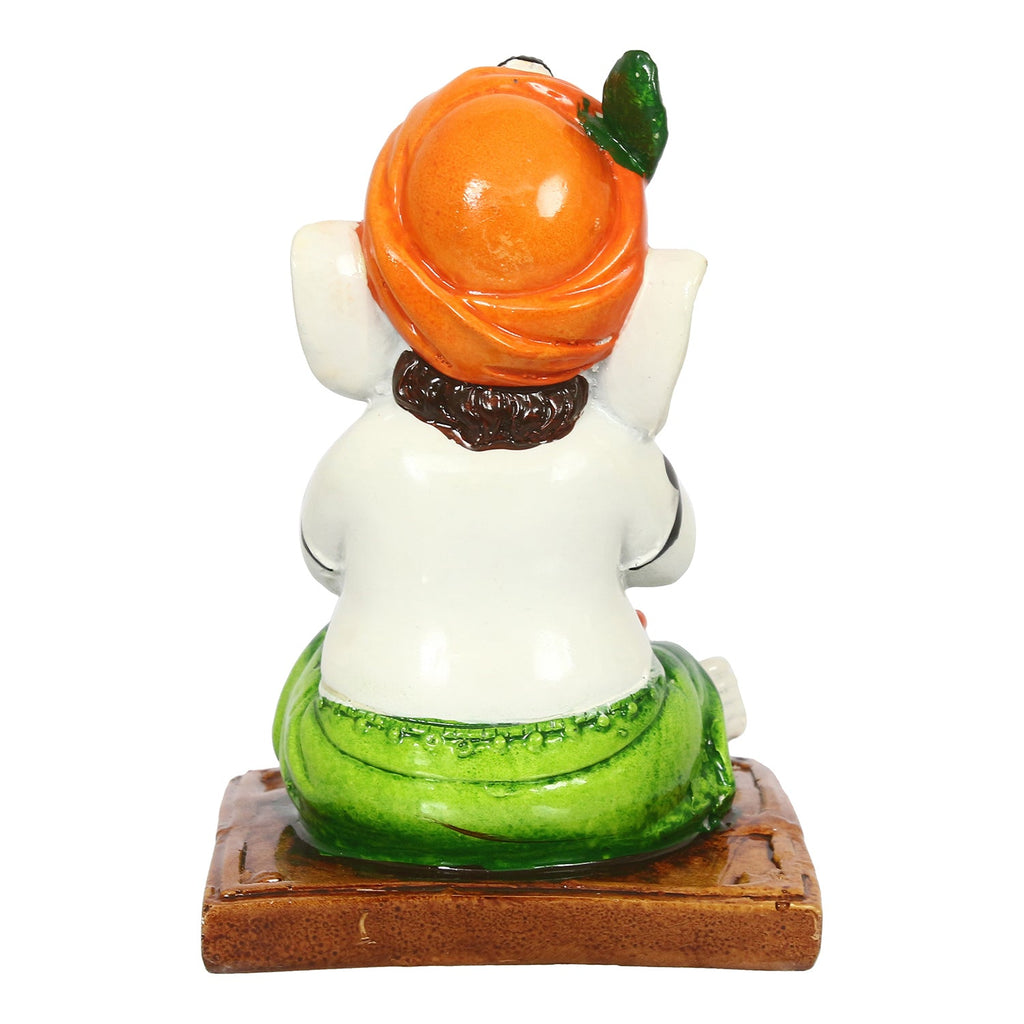 Decorative Polyresin Lord Ganesha Idol eating Ladoo in Lord Krishna Avatar (White, Orange, Green) Kafalo