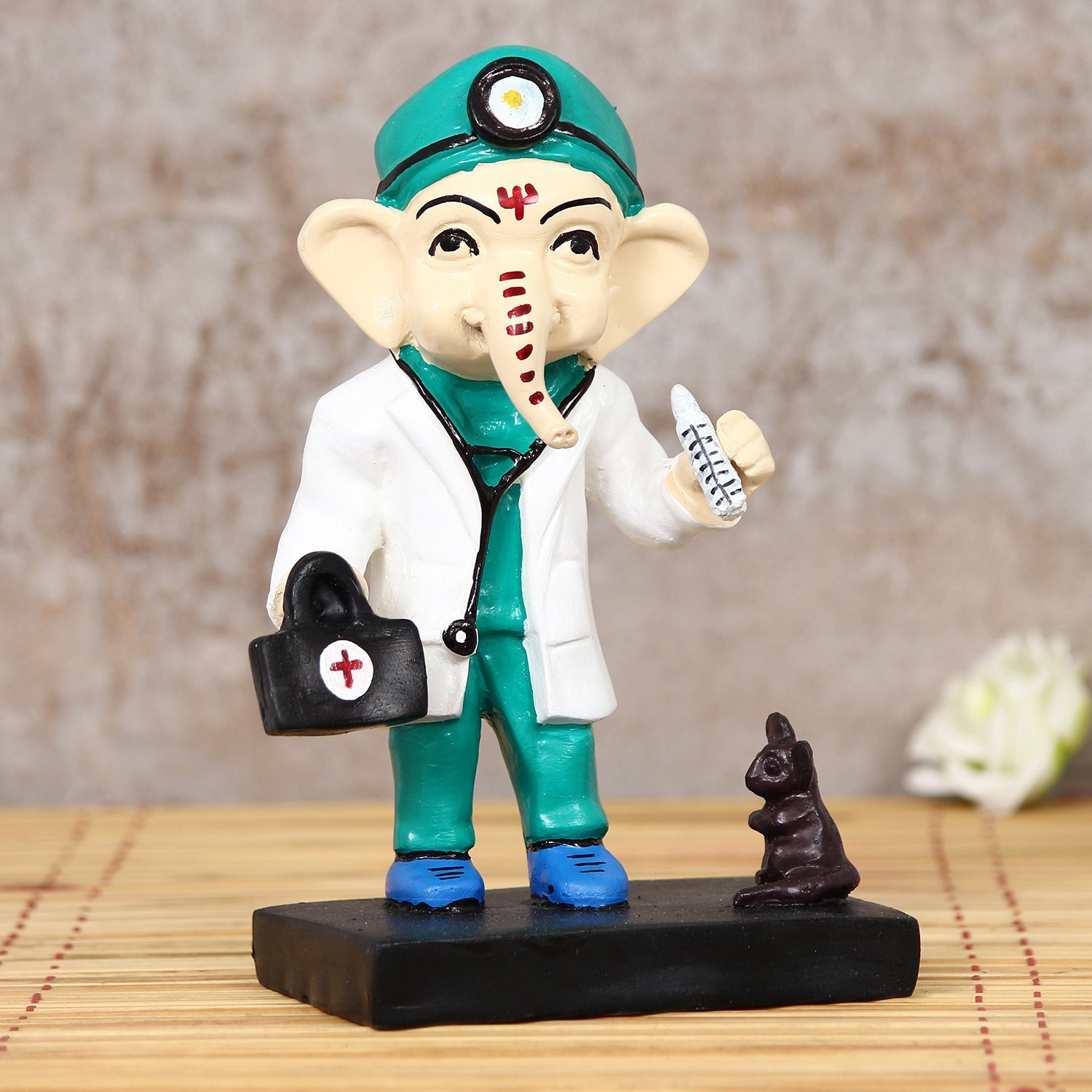 Polyresin Decorative Lord Ganesha Idol in Doctor Avatar (Green, White, Black and Blue) Kafalo