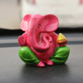 Pink and Green Polyresin Lord Ganesha Idol for Car Dashboard, Home Temple and Office Desks Kafalo