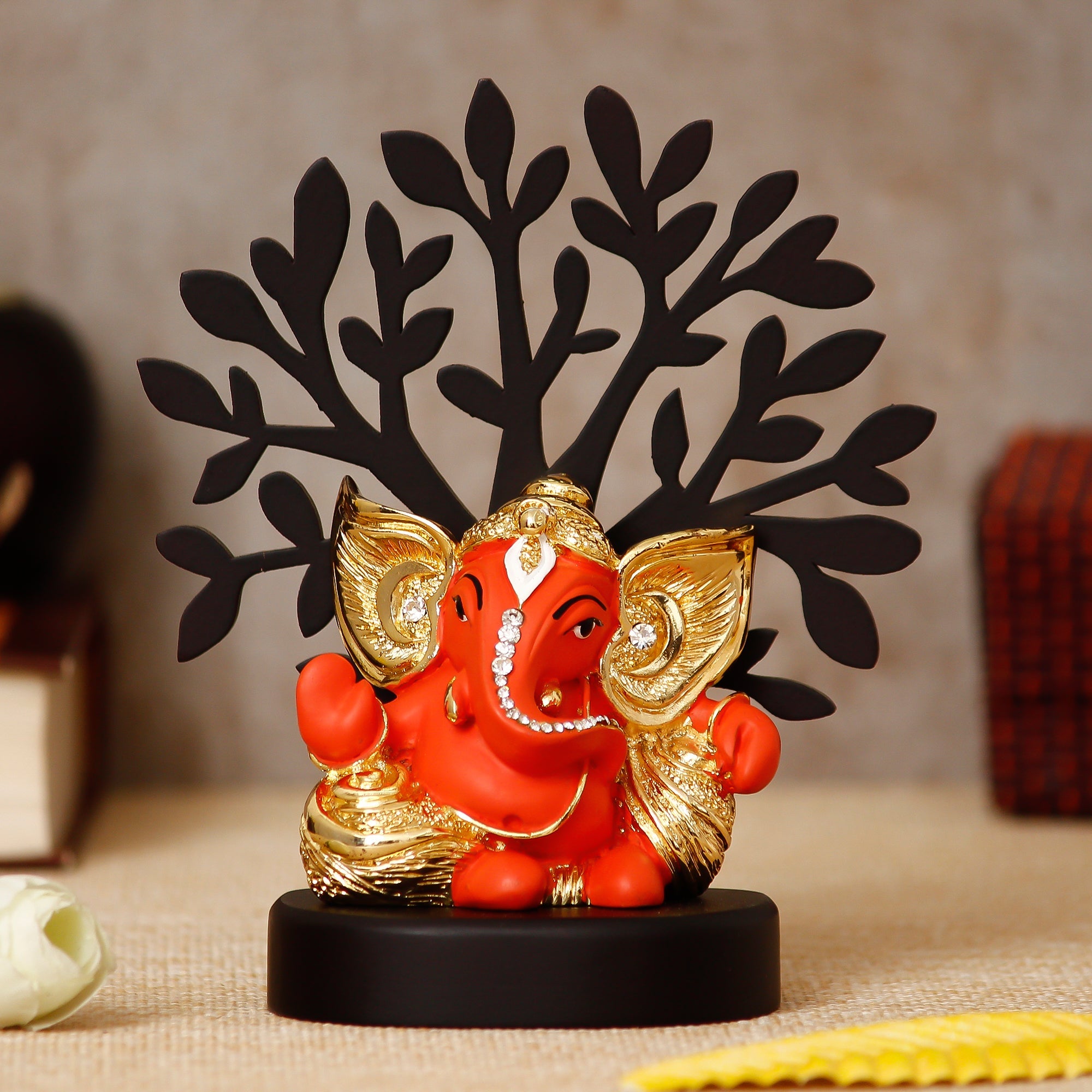 Gold Plated Orange Polyresin Ganesha Statue with Wooden Tree for Home, Temple, Office and Car Dashboard Kafalo