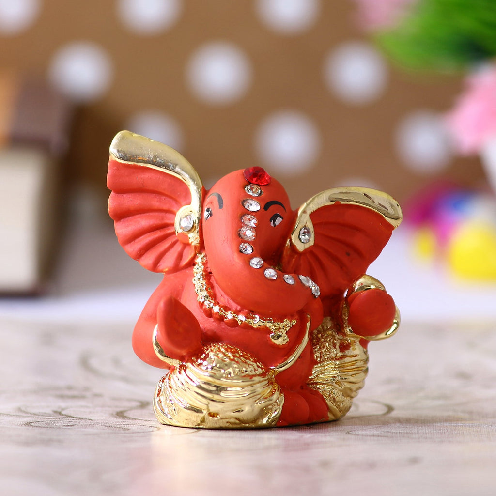 Gold Plated and Orange Polyresin Lord Ganesha Idol for Home, Temple, Office and Car Kafalo