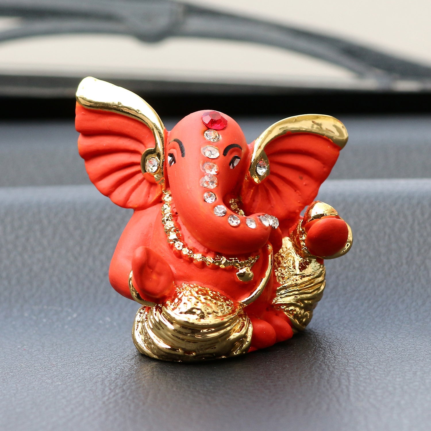 Gold Plated and Orange Polyresin Lord Ganesha Idol for Home, Temple, Office and Car Kafalo