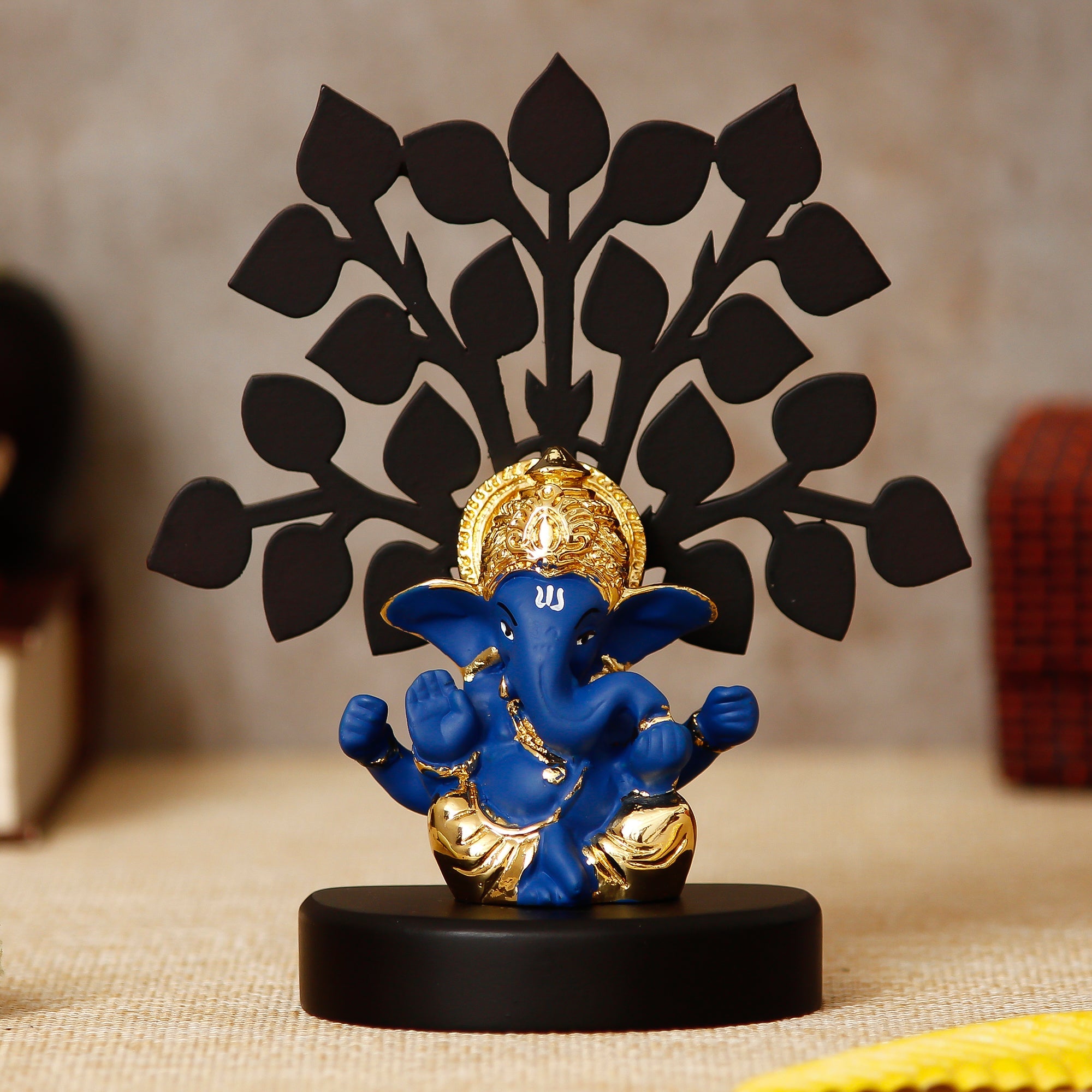 Gold Plated Blue Polyresin Ganesha Idol with Wooden Tree for Home, Temple, Office and Car Dashboard Kafalo