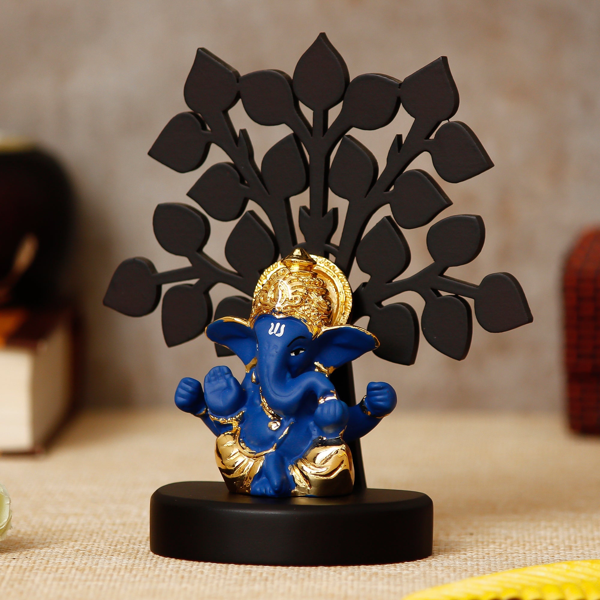 Gold Plated Blue Polyresin Ganesha Idol with Wooden Tree for Home, Temple, Office and Car Dashboard Kafalo