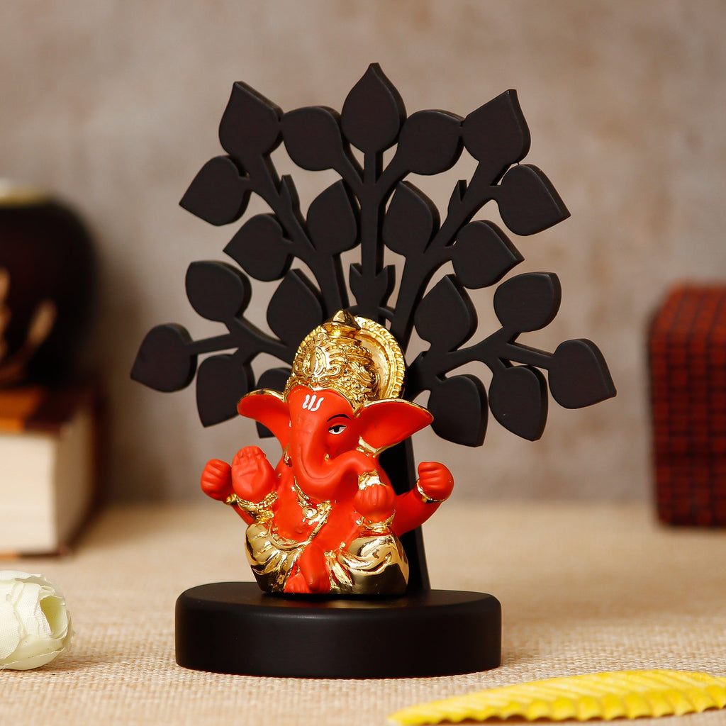 Gold Plated Orange Polyresin Ganesha Idol/Murti with Wooden Tree for Home, Temple, Office and Car Dashboard Kafalo