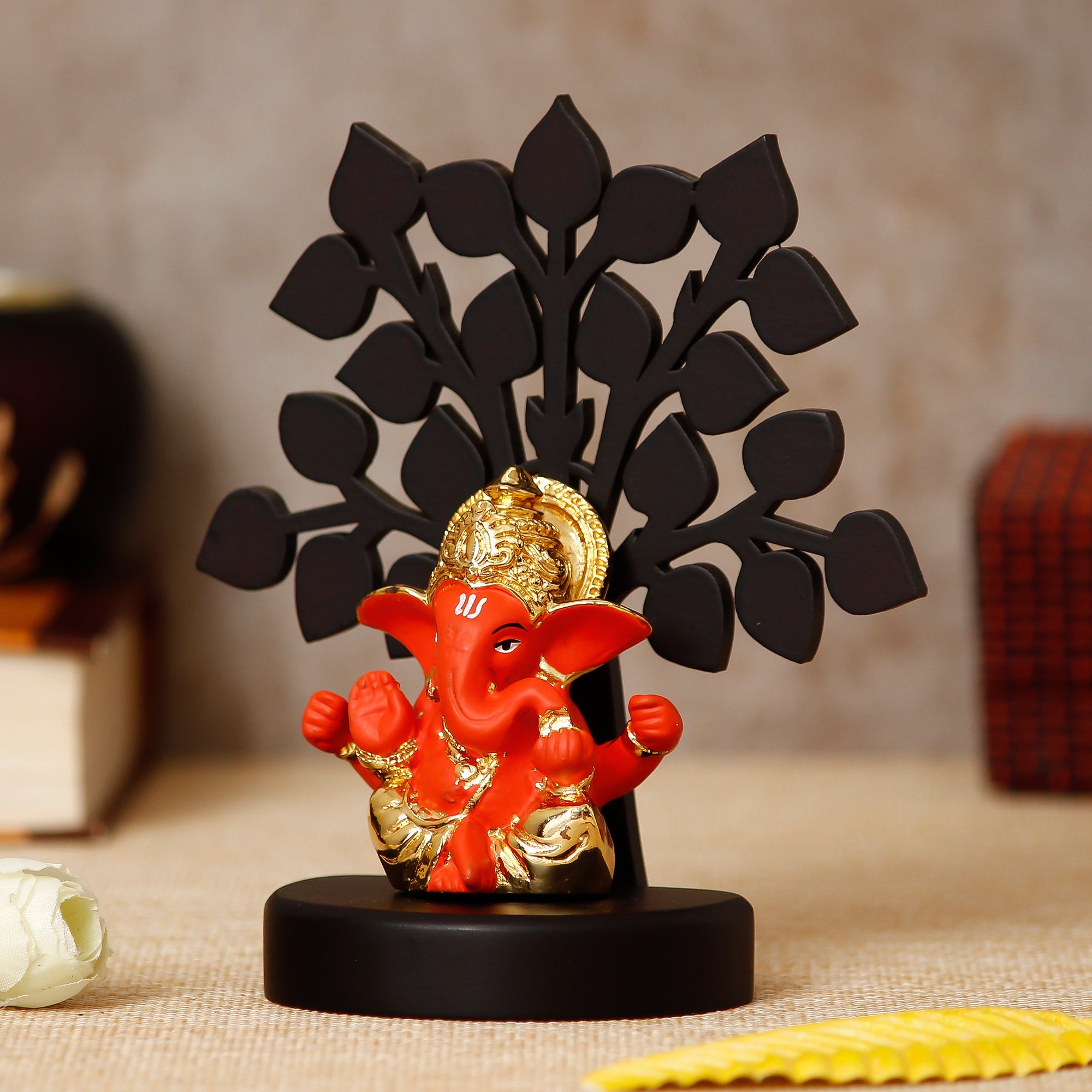 Gold Plated Orange Polyresin Ganesha Idol/Murti with Wooden Tree for Home, Temple, Office and Car Dashboard Kafalo