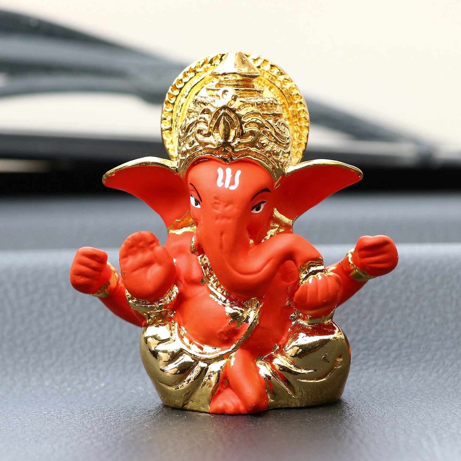 Gold Plated Orange Polyresin Lord Ganesha Idol for Home, Temple, Office and Car Dashboard Kafalo