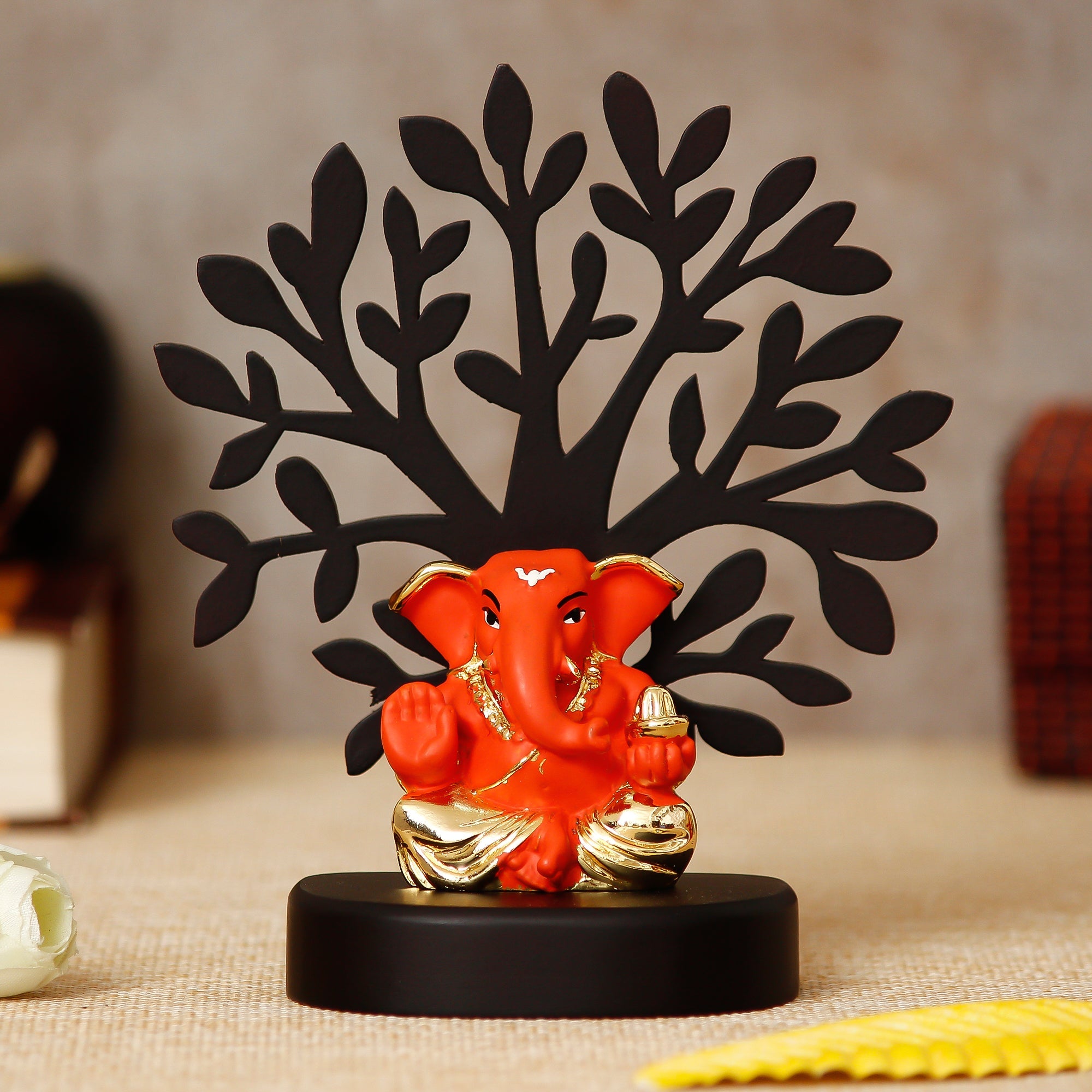 Gold Plated Orange Polyresin Appu Ganesha Idol with Wooden Tree for Home, Temple, Office and Car Dashboard Kafalo