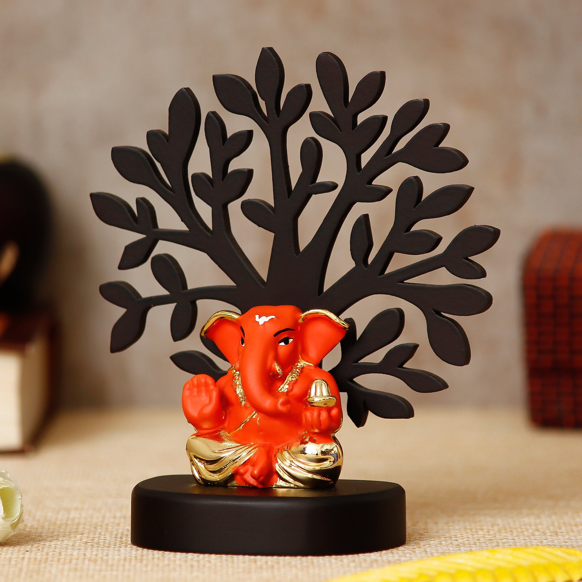 Gold Plated Orange Polyresin Appu Ganesha Idol with Wooden Tree for Home, Temple, Office and Car Dashboard Kafalo