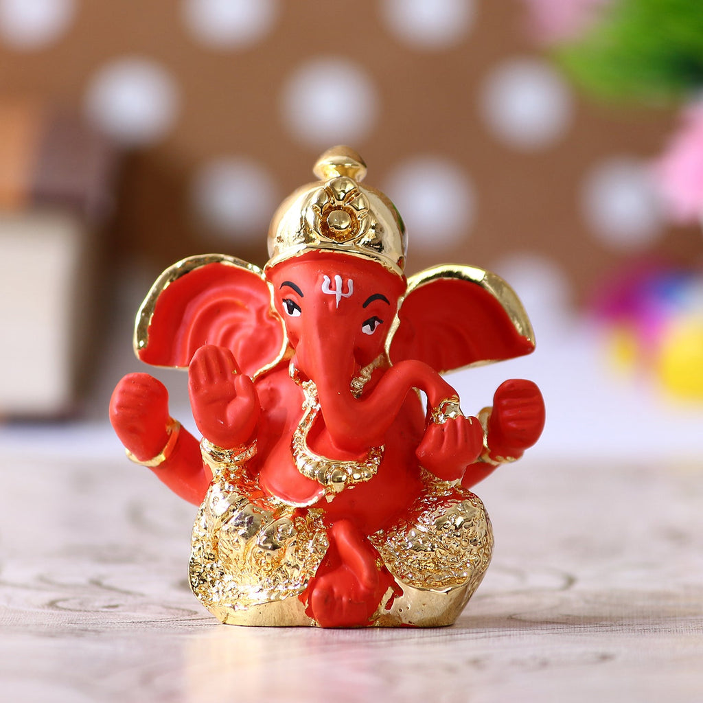 Gold Plated Orange Polyresin Ganesha Idol for Home, Temple, Office and Car Dashboard Kafalo