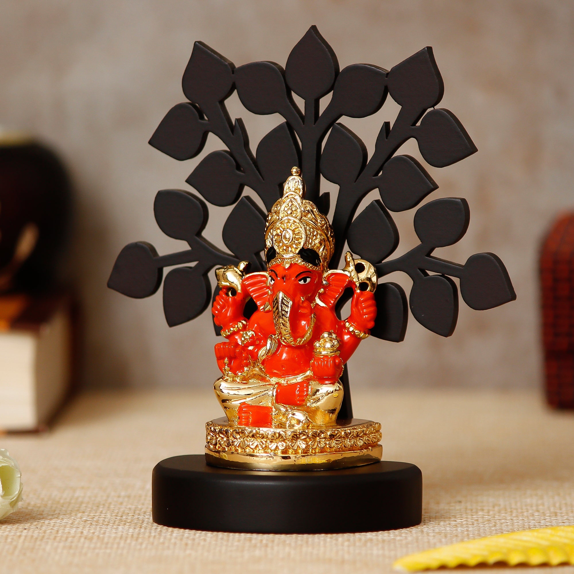 Gold Plated Orange Polyresin Ganesha Idol with Wooden Tree for Home, Temple, Office and Car Dashboard Kafalo