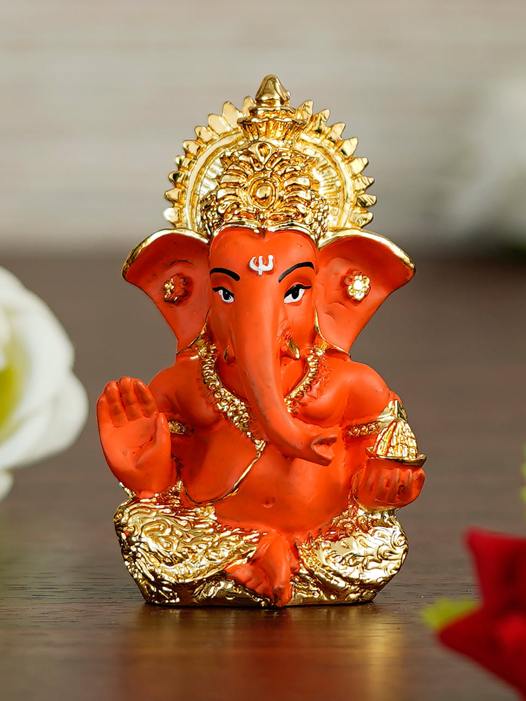 Gold Plated Orange Polyresin Ganesha Idol for Home, Temple, Office and Car Dashboard Kafalo