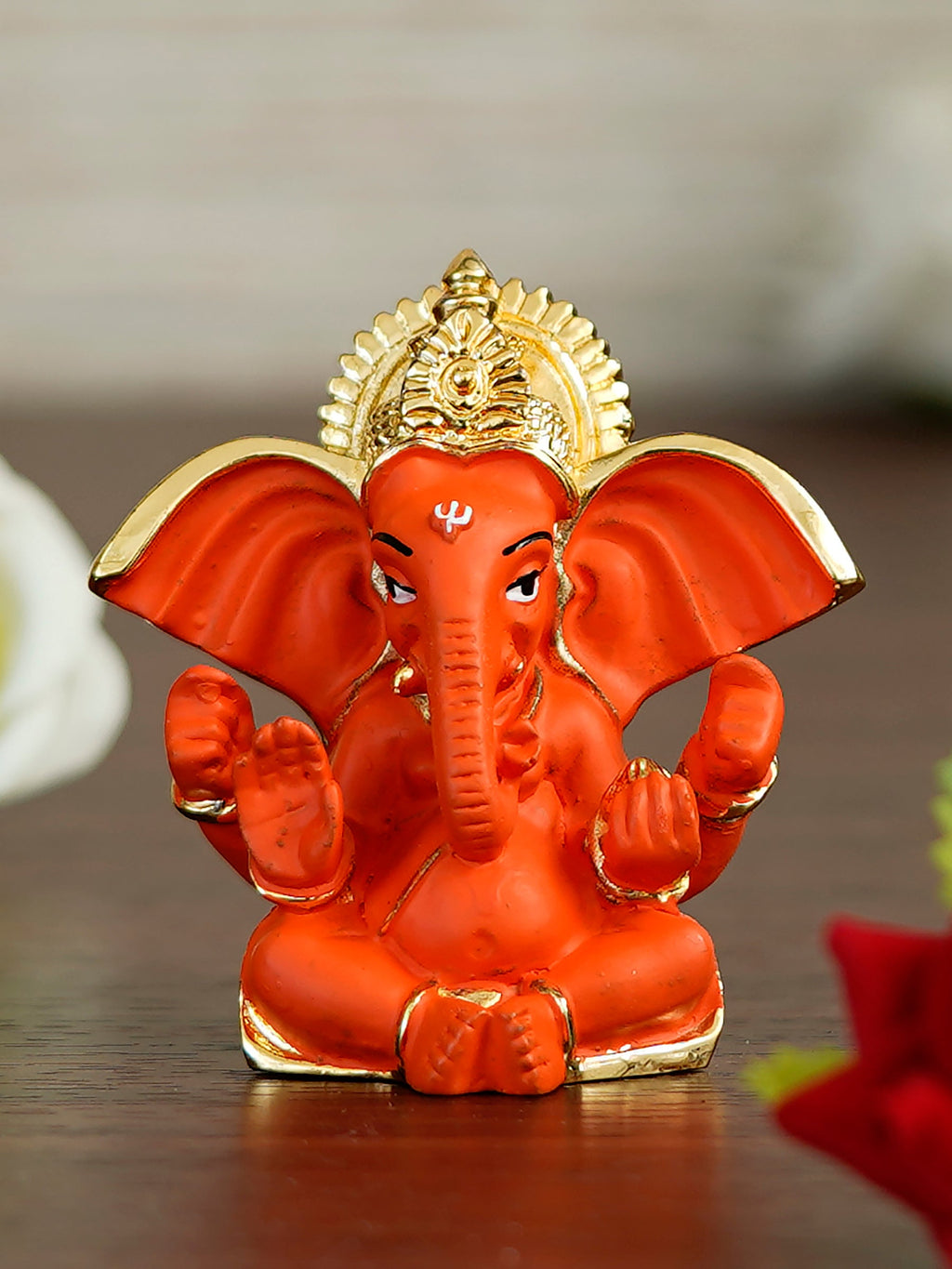 Gold Plated Orange Polyresin Ganesha Idol for Home, Temple, Office and Car Dashboard Kafalo