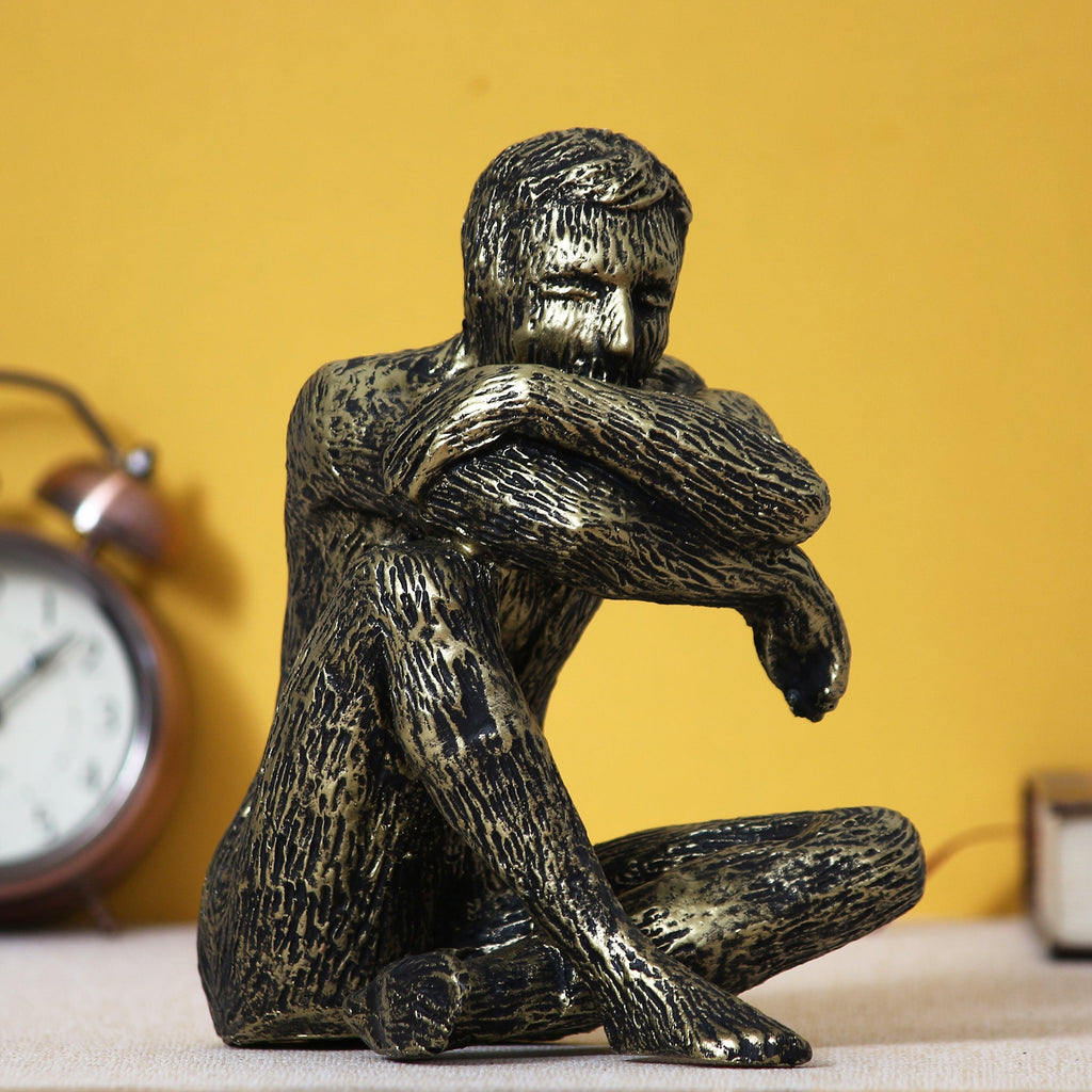 Golden and Black Polyresin Man Figurine Sitting in Thinking Position Kafalo