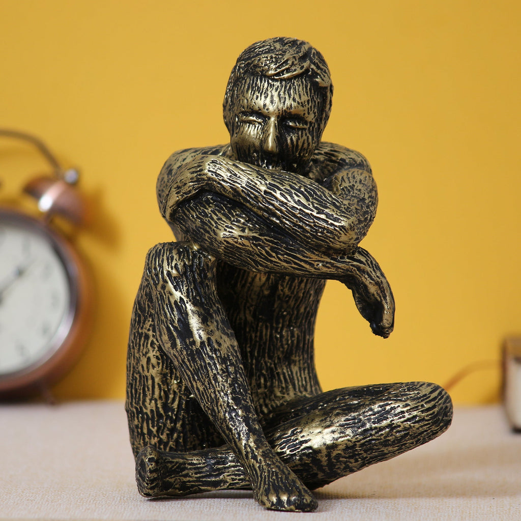 Golden and Black Polyresin Man Figurine Sitting in Thinking Position Kafalo