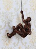 Brown Polyresin Climbing Man Wall Hanging Statue Kafalo