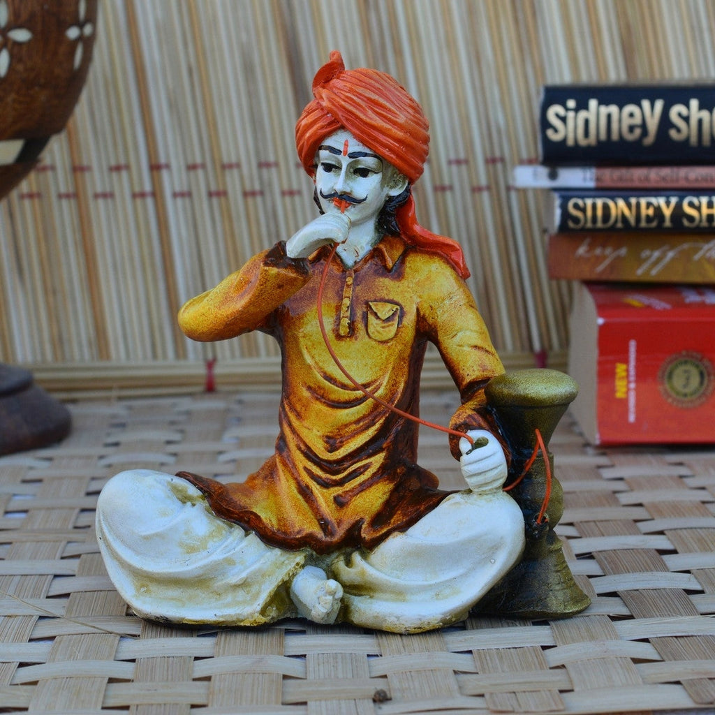 Polyresin Rajasthani Man Using Hookah Handcrafted Decorative Showpiece (Yellow, Orange and Brown) Kafalo