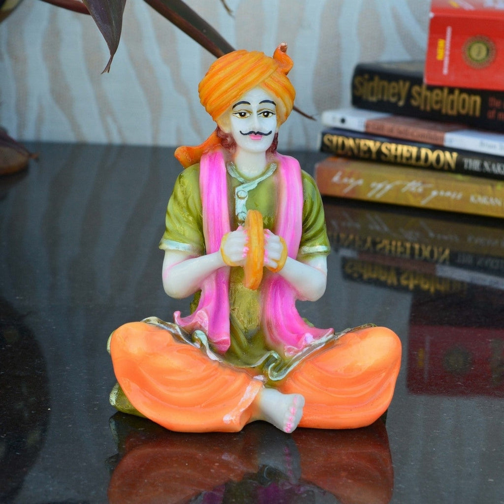 Polyresin Rajasthani Musician Playing Hand Cymbals Handcrafted Decorative Showpiece (Green, Pink, Orange) Kafalo
