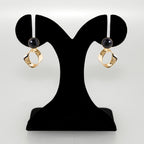 Modern Twist Dangle Earrings Black Nestasia