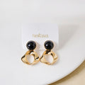 Modern Twist Dangle Earrings Black Nestasia