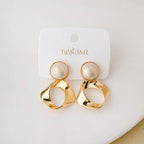 Modern Twist Dangle Earrings White Nestasia